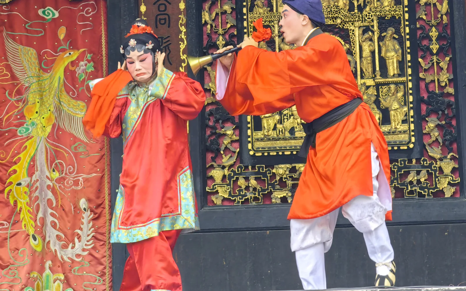 Two performers in a 2024 Foshan Cantonese Opera Troupe scene at Wanfutai