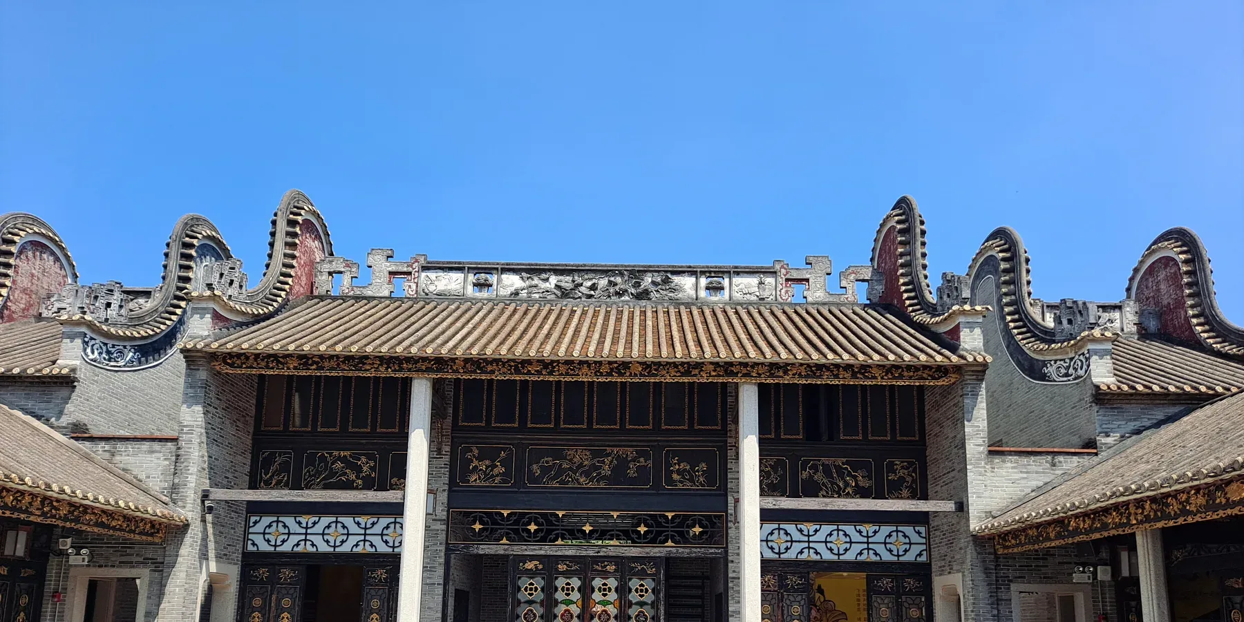 Roofline and upper facade of Wong Fei-hung Memorial Hall in Chancheng