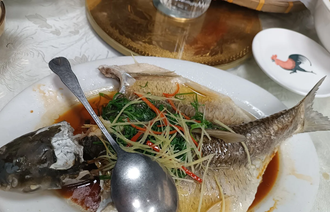 A whole fish dish labelled as steamed fish by the Commons creator