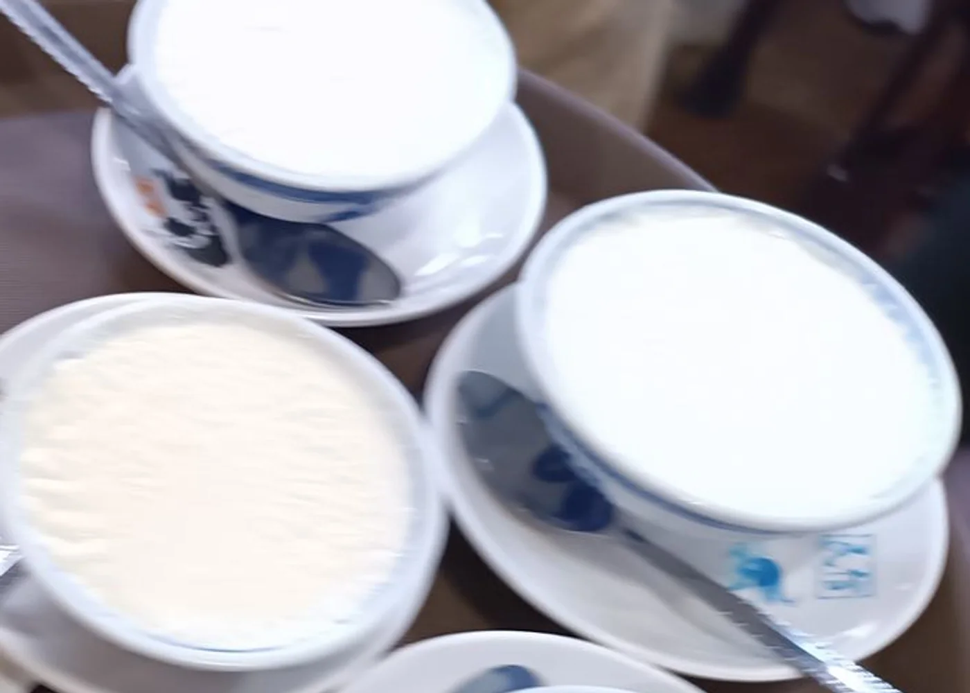 Bowls of double-skin milk on a tray in Shunde